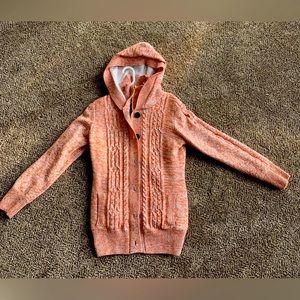 Brand New Orange Sherpa Jacket with zipper and front pockets.